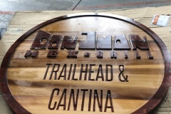 Carved wood sign