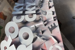 Pieces of channel letters in Lehighton being assembled